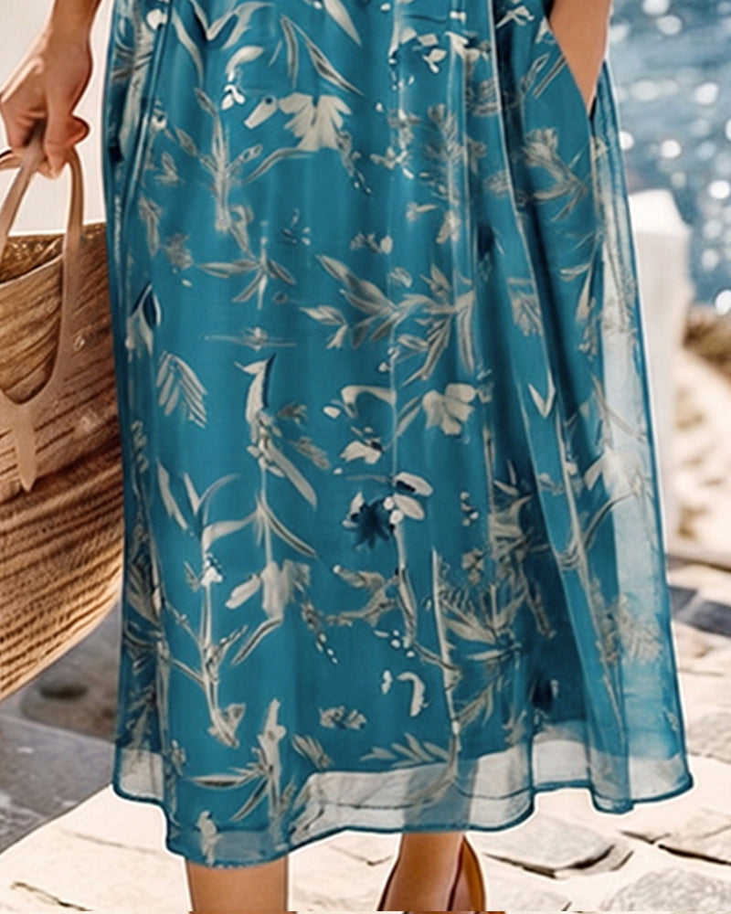 Andressa | Vestido midi floral ligero y fluido