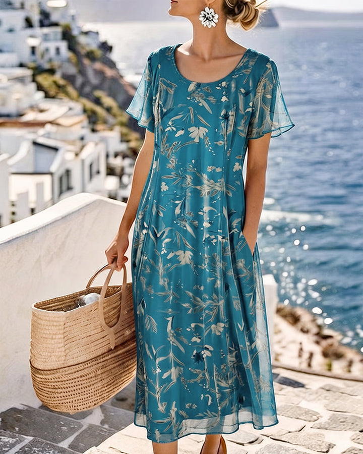 Andressa | Vestido midi floral ligero y fluido